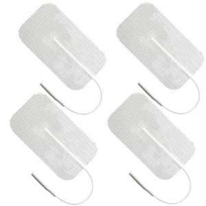 Four TWC24 Economic Rectangle 2" x 4" White Cloth Reusable Electrodes in a sealed pack, designed for electrotherapy use